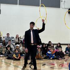 Mr. Sambrook learning to hoop dance